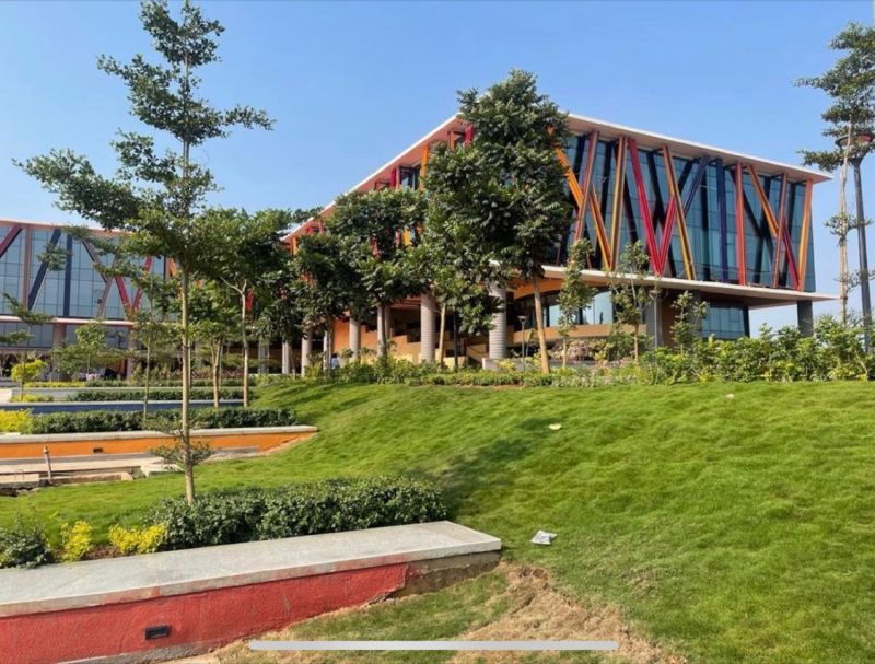 Completed glazed facade with coloured diagonal fins at the Aditya Birla Global Training Centre